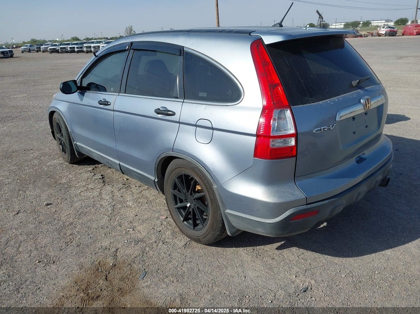 2009 HONDA CR-V VIN: JHLRE38599C004833