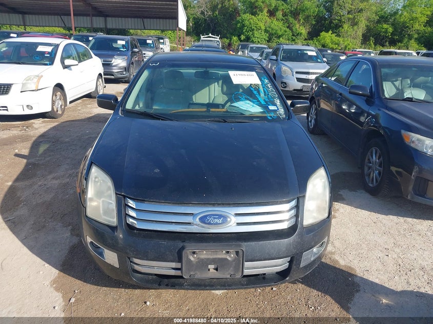 2009 FORD FUSION VIN: 3FAHP08159R213704