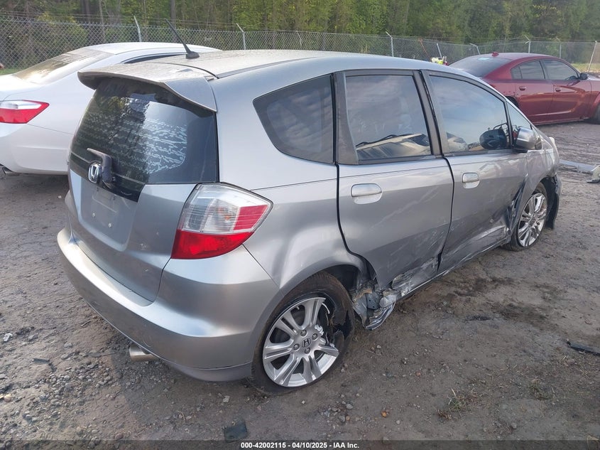 2009 HONDA FIT VIN: JHMGE88469C000715
