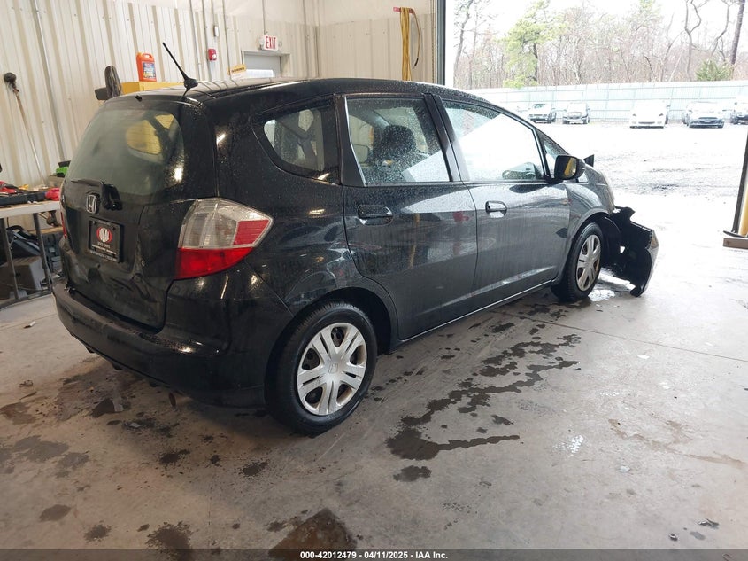2009 HONDA FIT VIN: JHMGE88279S072365