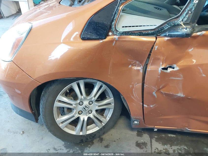 2009 HONDA FIT VIN: JHMGE88639S044176