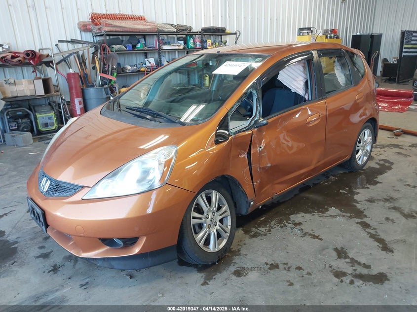 2009 HONDA FIT VIN: JHMGE88639S044176