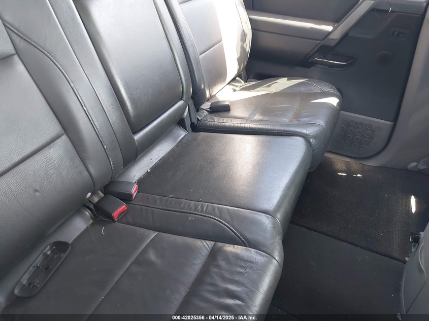 2004 Nissan Titan Le VIN: 1N6AA07A24N561998 Lot: 42025356