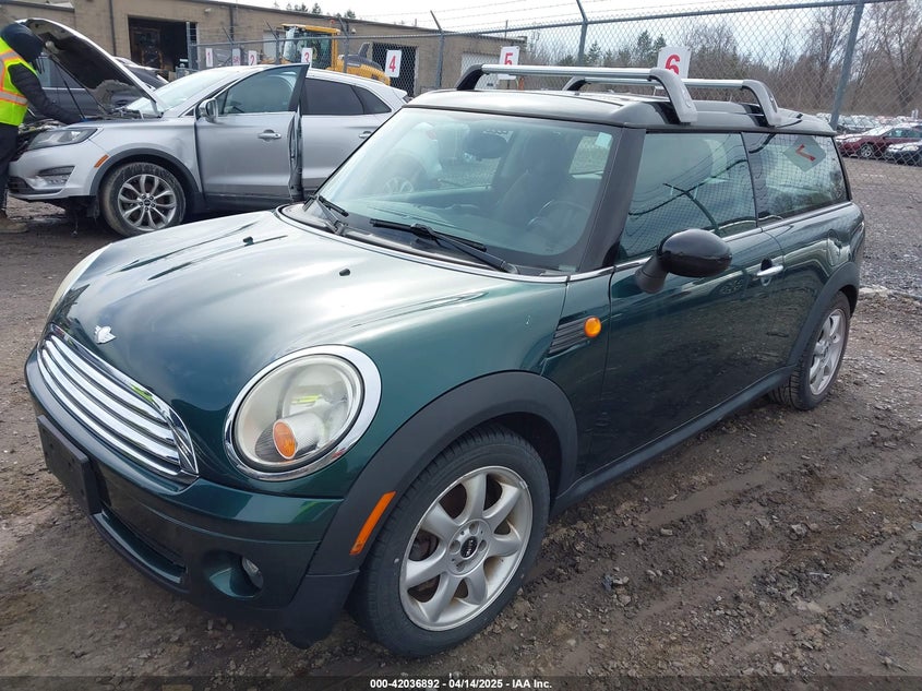 2010 MINI COOPER CLUBMAN VIN: WMWML3C56ATX37444