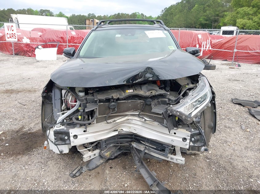 VIN JTMRWRFV2MD133113 2021 TOYOTA RAV4 HYBRID XLE
