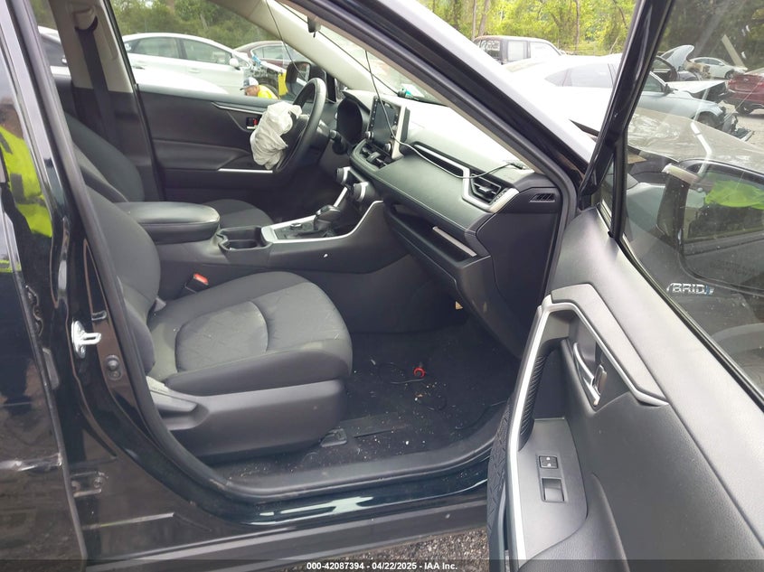 VIN JTMRWRFV2MD133113 2021 TOYOTA RAV4 HYBRID XLE