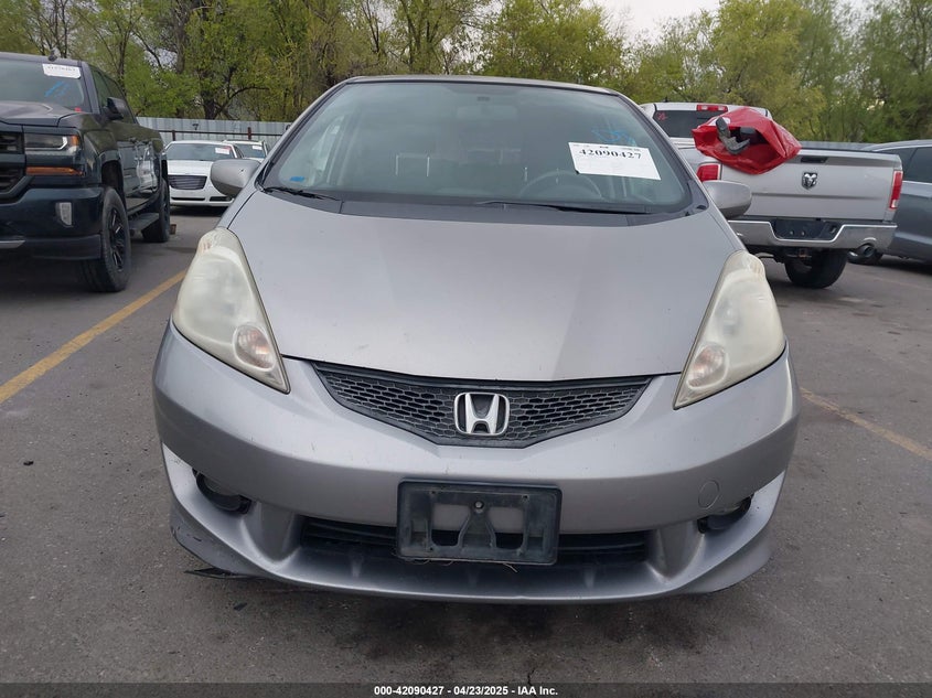 2009 HONDA FIT VIN: JHMGE88489S012483