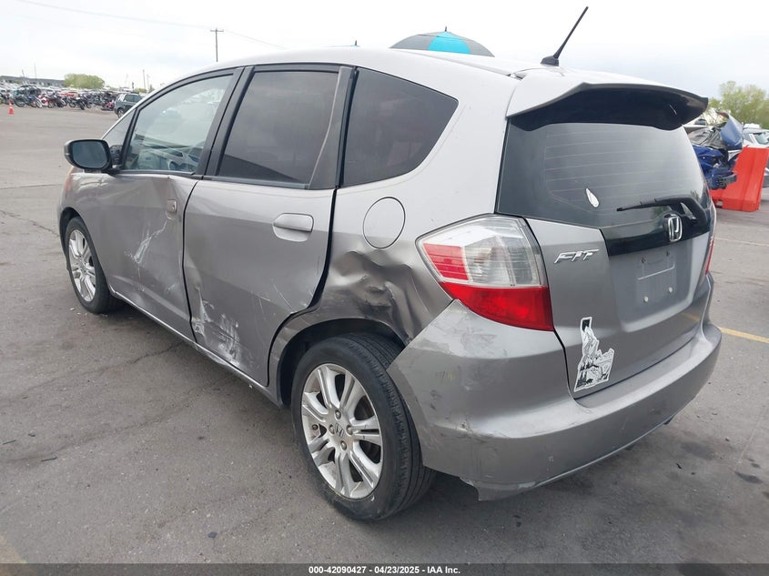 2009 HONDA FIT VIN: JHMGE88489S012483