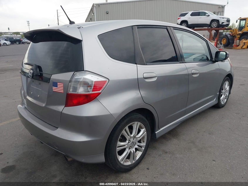 2009 HONDA FIT VIN: JHMGE88489S012483