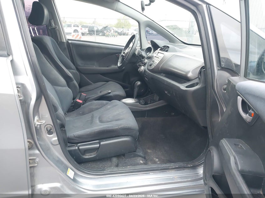 2009 HONDA FIT VIN: JHMGE88489S012483
