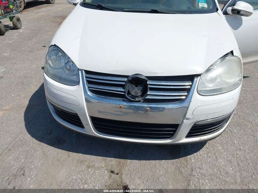 2009 VOLKSWAGEN JETTA VIN: 3VWRM71K99M057390