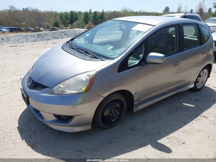 2009 HONDA FIT VIN: JHMGE874X9S002748