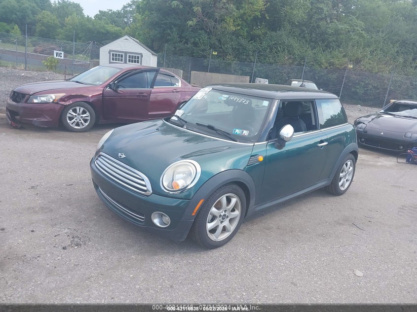 2009 MINI COOPER VIN: WMWMF33559TW74873