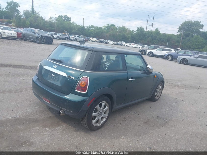 2009 MINI COOPER VIN: WMWMF33559TW74873