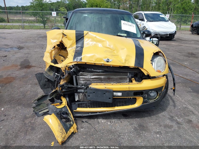 2009 MINI COOPER VIN: WMWMF33579TT69729