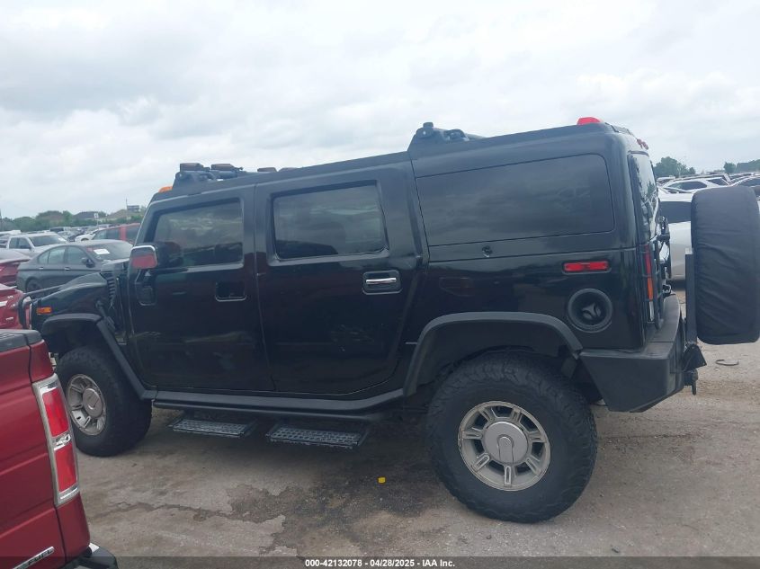 2003 Hummer H2 VIN: 5GRGN23U83H106307 Lot: 42132078