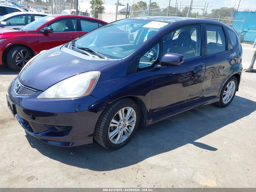 2010 HONDA FIT VIN: JHMGE8H47AC021044