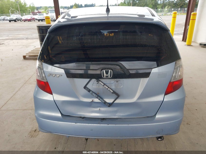 2009 HONDA FIT VIN: JHMGE884X9S042293