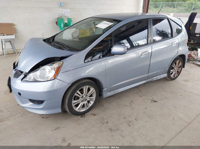 2009 HONDA FIT VIN: JHMGE884X9S042293