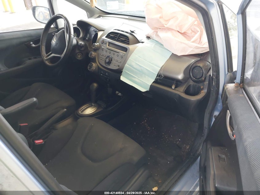 2009 HONDA FIT VIN: JHMGE884X9S042293