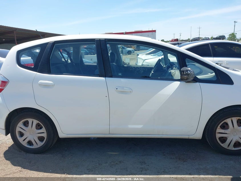 2009 HONDA FIT VIN: JHMGE88239S045275