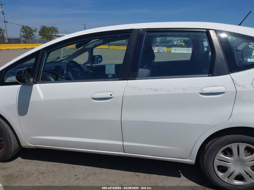 2009 HONDA FIT VIN: JHMGE88239S045275