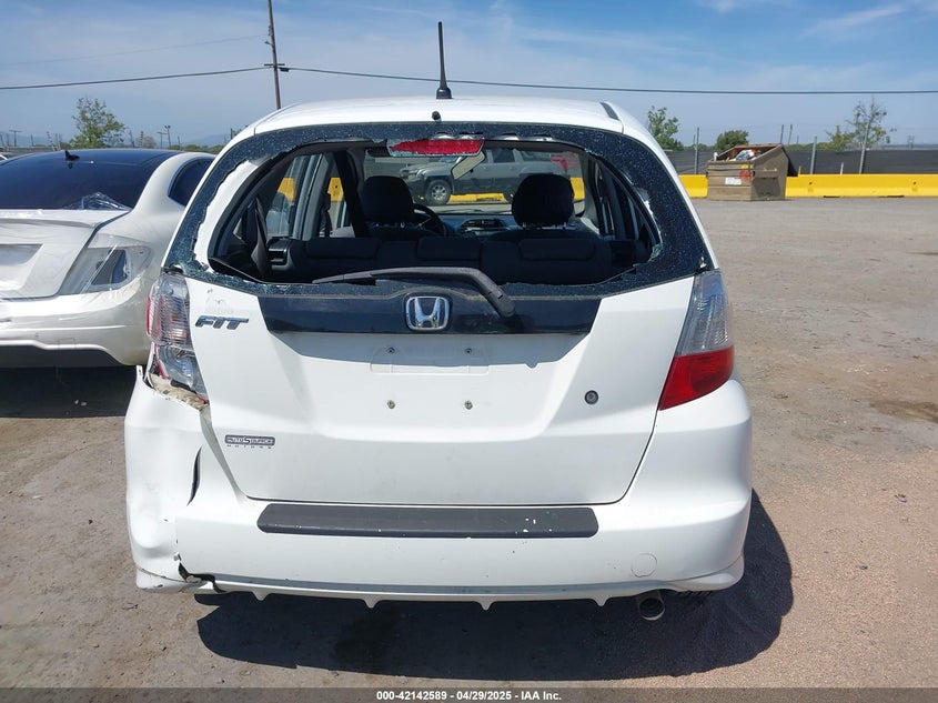2009 HONDA FIT VIN: JHMGE88239S045275