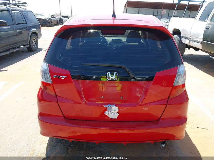 2009 HONDA FIT VIN: JHMGE884X9S038888