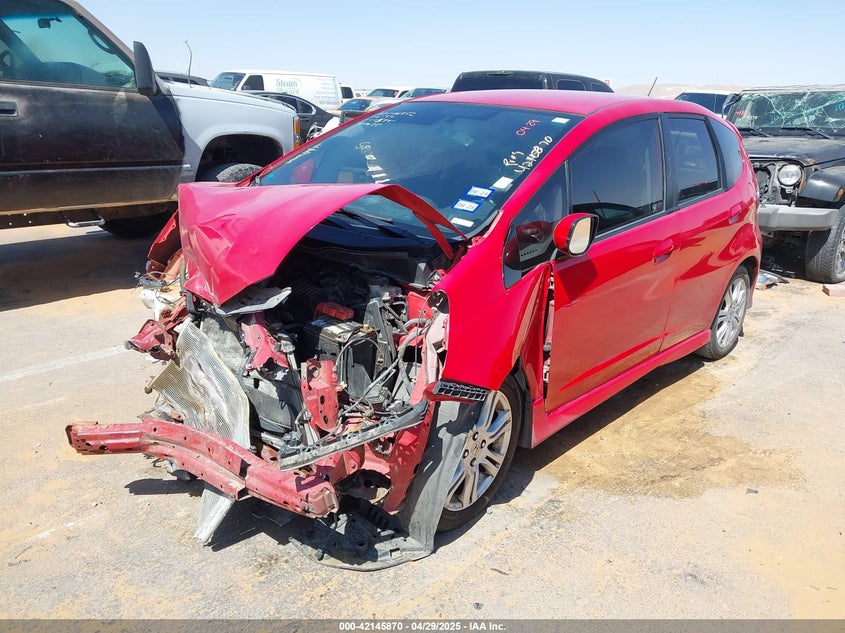 2009 HONDA FIT VIN: JHMGE884X9S038888