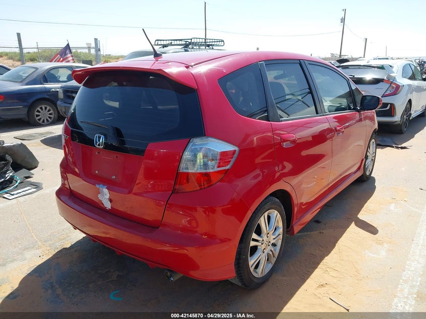 2009 HONDA FIT VIN: JHMGE884X9S038888