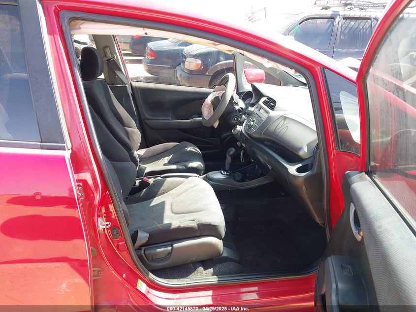 2009 HONDA FIT VIN: JHMGE884X9S038888