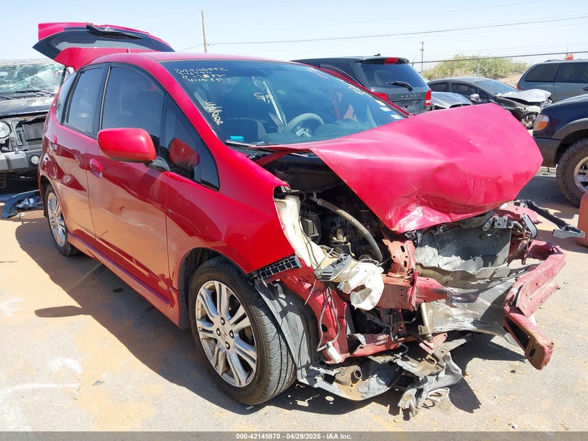 2009 HONDA FIT VIN: JHMGE884X9S038888