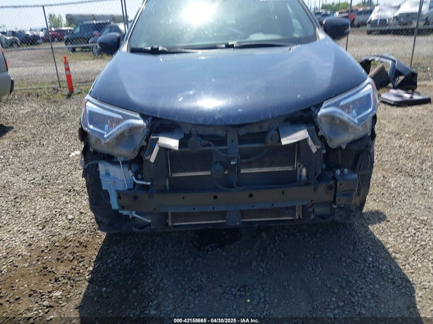 2018 TOYOTA RAV4 HYBRID SE - JTMJJREV9JD191552