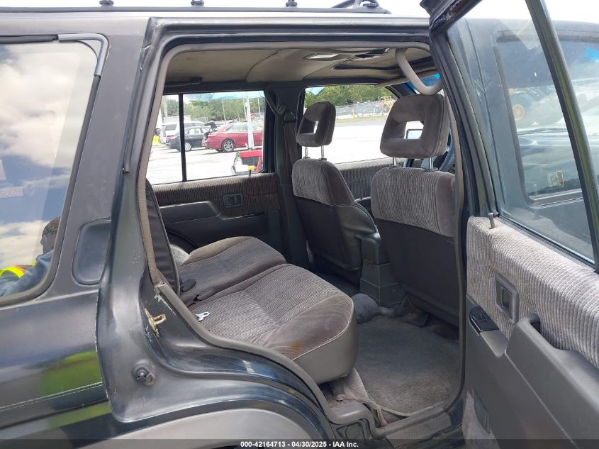 1990 Nissan Pathfinder VIN: JN8HD17Y7LW218807 Lot: 42164713