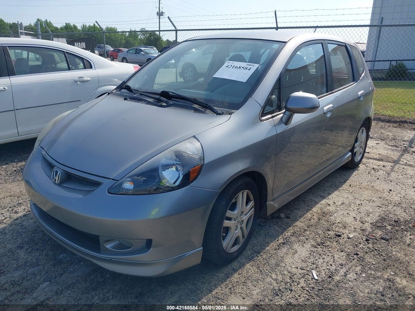 2008 HONDA FIT VIN: JHMGD386X8S058659
