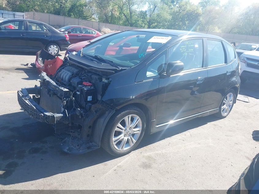 2010 HONDA FIT VIN: JHMGE8H40AC039689