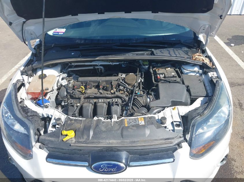 2014 Ford Focus Titanium VIN: 1FADP3J2XEL433464 Lot: 42174443