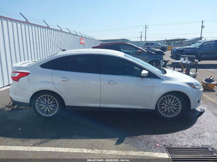2014 Ford Focus Titanium VIN: 1FADP3J2XEL433464 Lot: 42174443