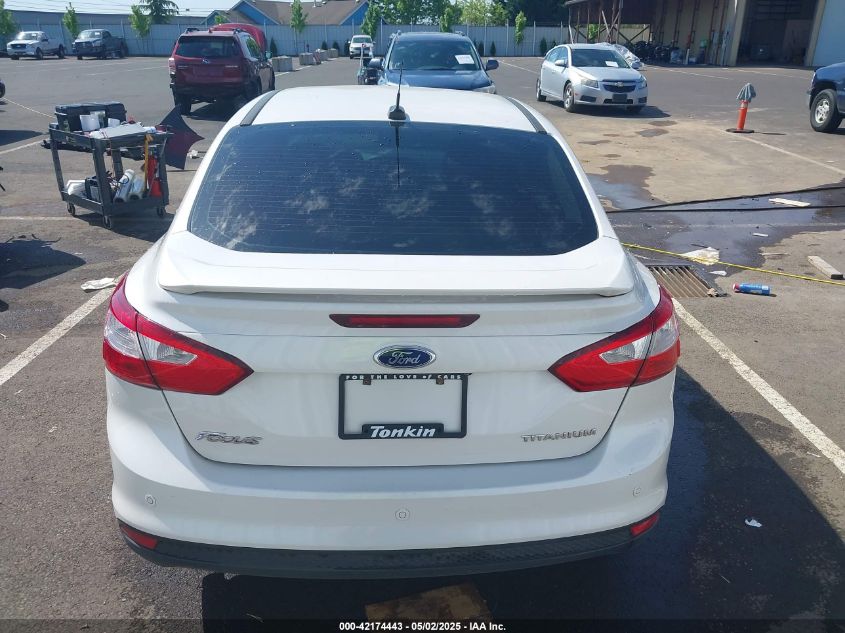 2014 Ford Focus Titanium VIN: 1FADP3J2XEL433464 Lot: 42174443