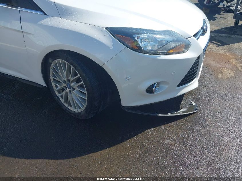2014 Ford Focus Titanium VIN: 1FADP3J2XEL433464 Lot: 42174443