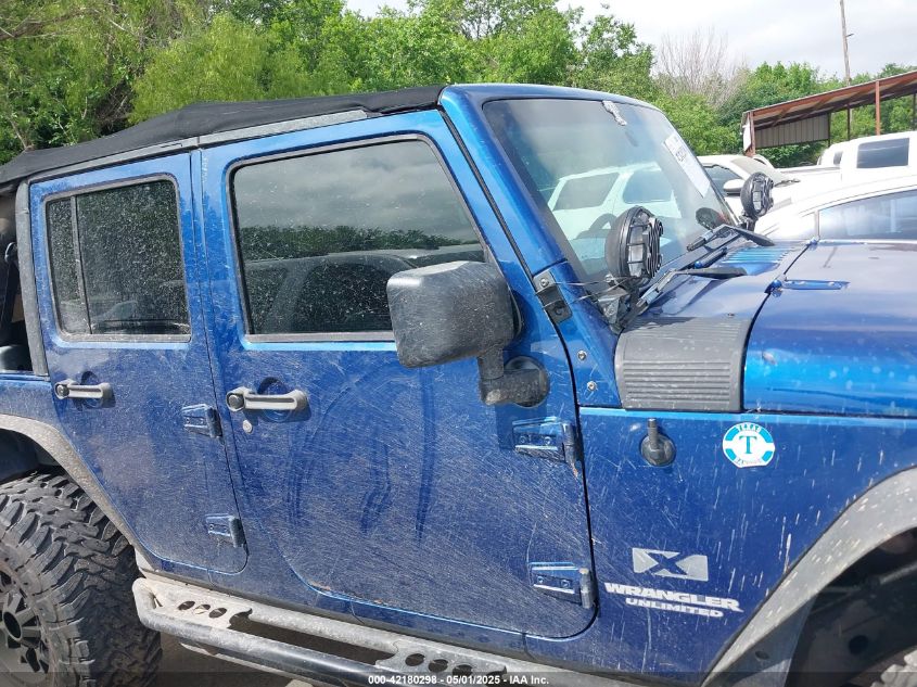 2009 Jeep Wrangler Unlimited X VIN: 1J4GA39199L744467 Lot: 42180298