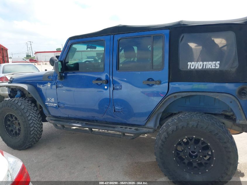 2009 Jeep Wrangler Unlimited X VIN: 1J4GA39199L744467 Lot: 42180298