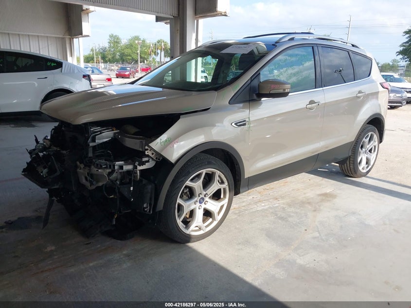 VIN 1FMCU0J98HUD16082 2017 FORD ESCAPE TITANIUM