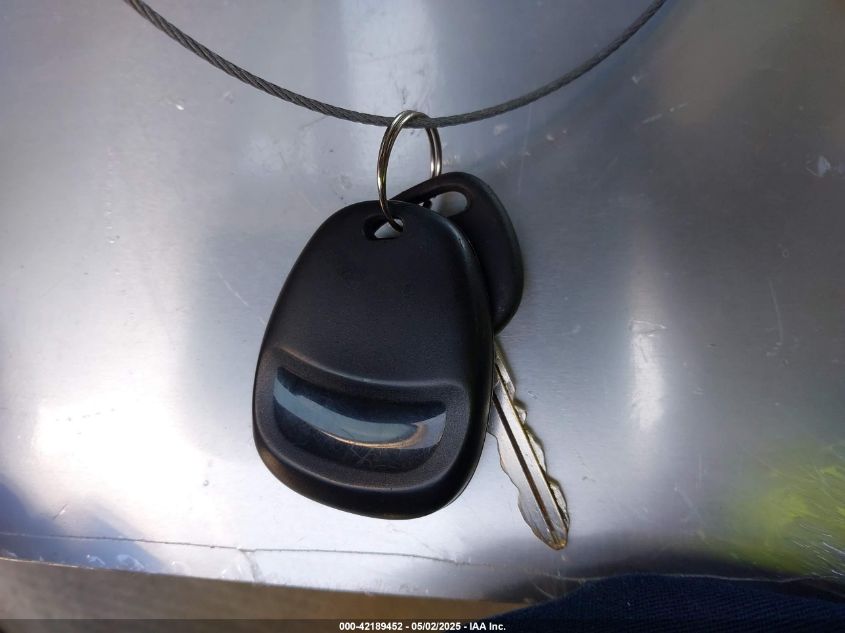 2004 Chevrolet Tahoe Ls VIN: 1GNEC13T44R208111 Lot: 42189452