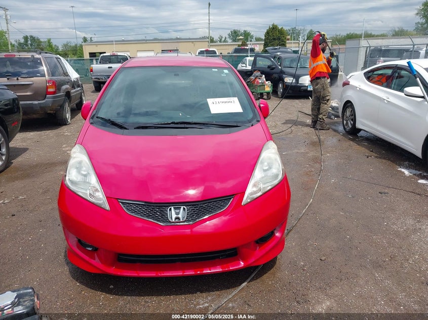 2009 HONDA FIT VIN: JHMGE884X9S050961