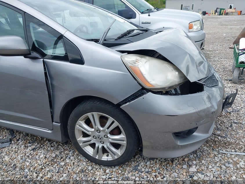 2009 HONDA FIT VIN: JHMGE87479S012637