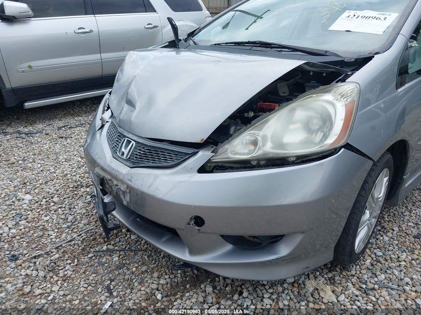 2009 HONDA FIT VIN: JHMGE87479S012637
