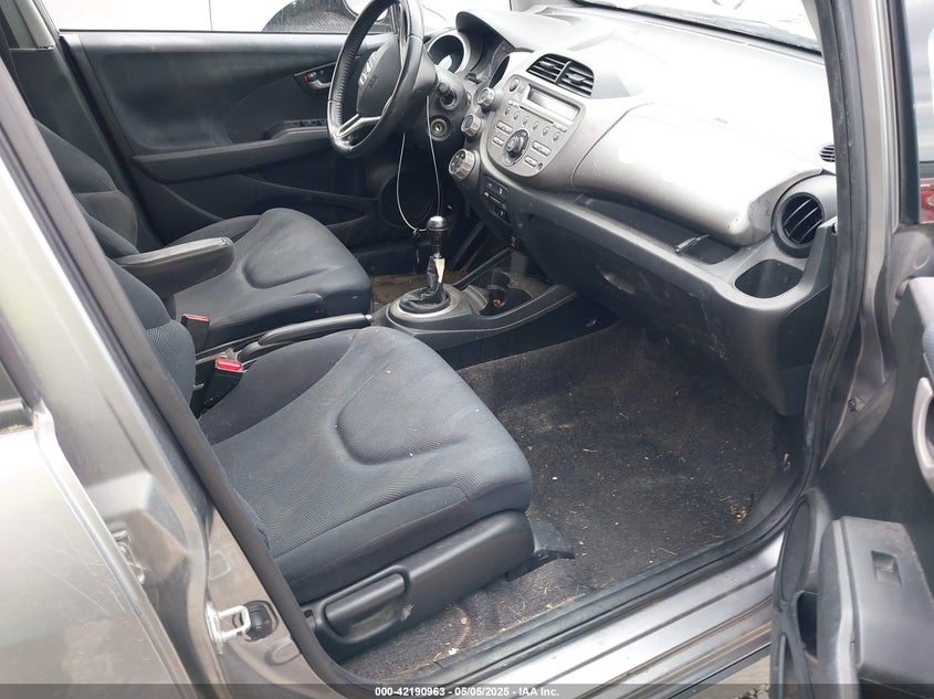 2009 HONDA FIT VIN: JHMGE87479S012637