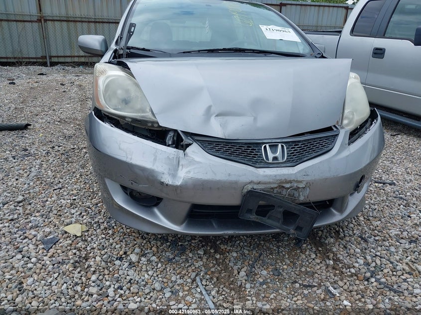 2009 HONDA FIT VIN: JHMGE87479S012637