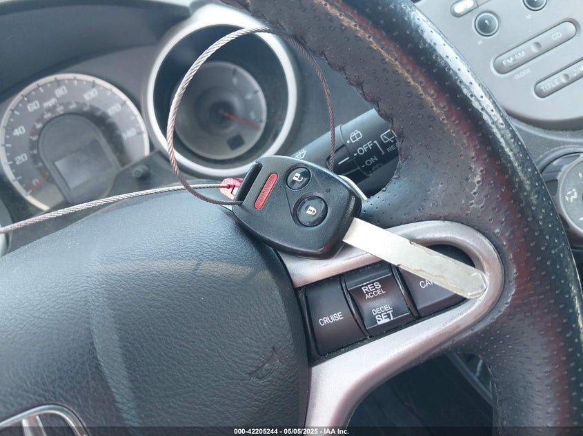 2009 HONDA FIT VIN: JHMGE884X9S017488